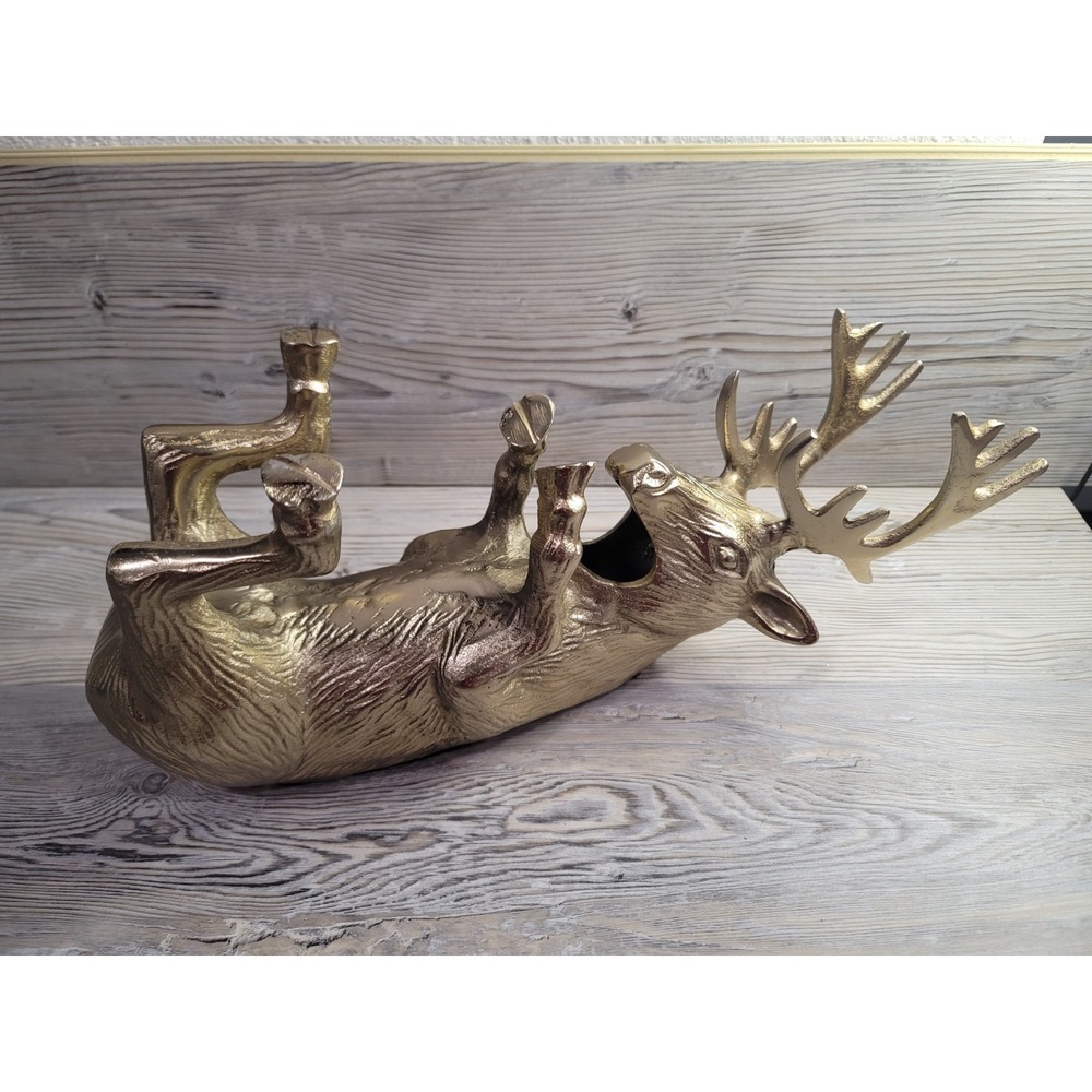 Vintage Elk brass wine bottle holder. Lays down craddles wine bottle with legs